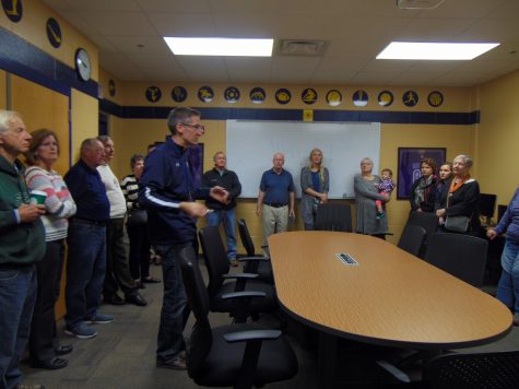 Grand Haven Hall of Fame receive a tour led by Grimes. of the “new” high school building. Inductees saw all of the new improvements in the building, including the changes to the athletic offices.