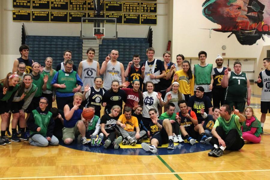 The boys and girls basketball team joins with special needs 