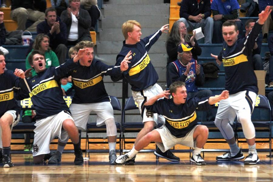 Five members of the boys basketball team dominate sidelines