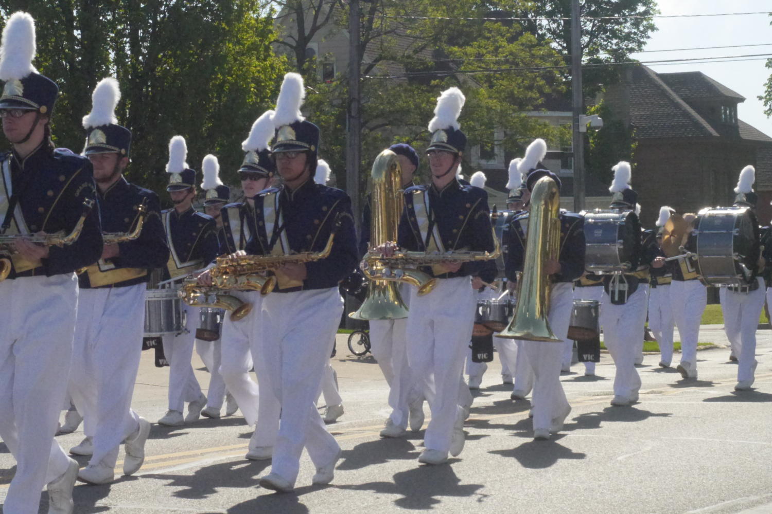 The marching band parades down Washington street for the Memorial Day parade.