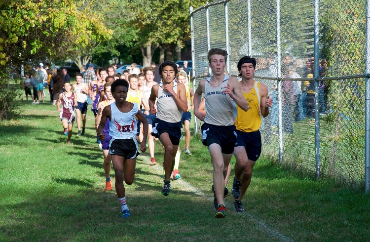 Juniors Aidan Martin and Dominic Weatherwax lead the pack during the O-K Red Conference championship meet. With their performances,  the Bucs were able to clinch the title outright and gain momentum for this upcoming race.