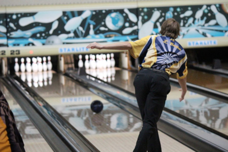 Senior Logan Batka attempts to get a strike as he releases the ball. 