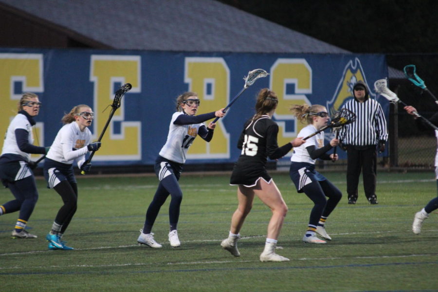 The Lady Bucs defense shuts down the opposing offenses charge into their third of the field. Led by senior Alexis Nesbitt (center) the Bucs stunted this attack