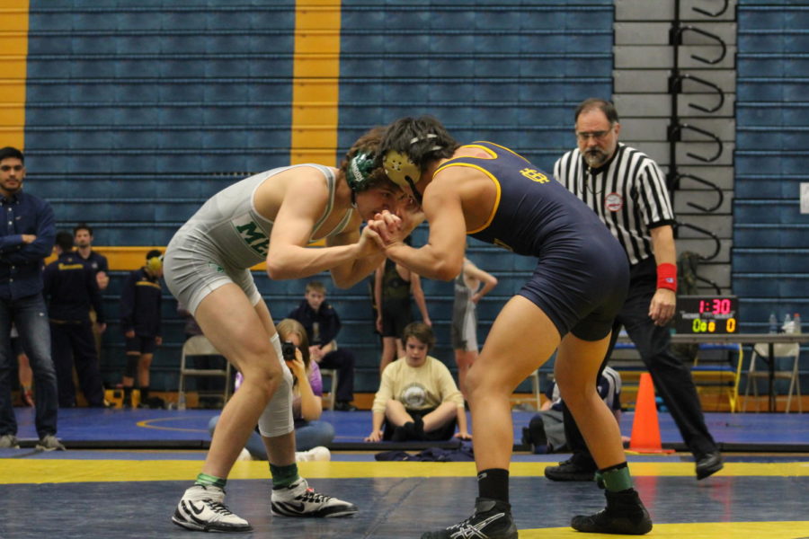 Daniel Guillen tossles with his opponent. Guillen has graduated, leaving senior Cody Miller and junior Riley Rhone to lead the team.