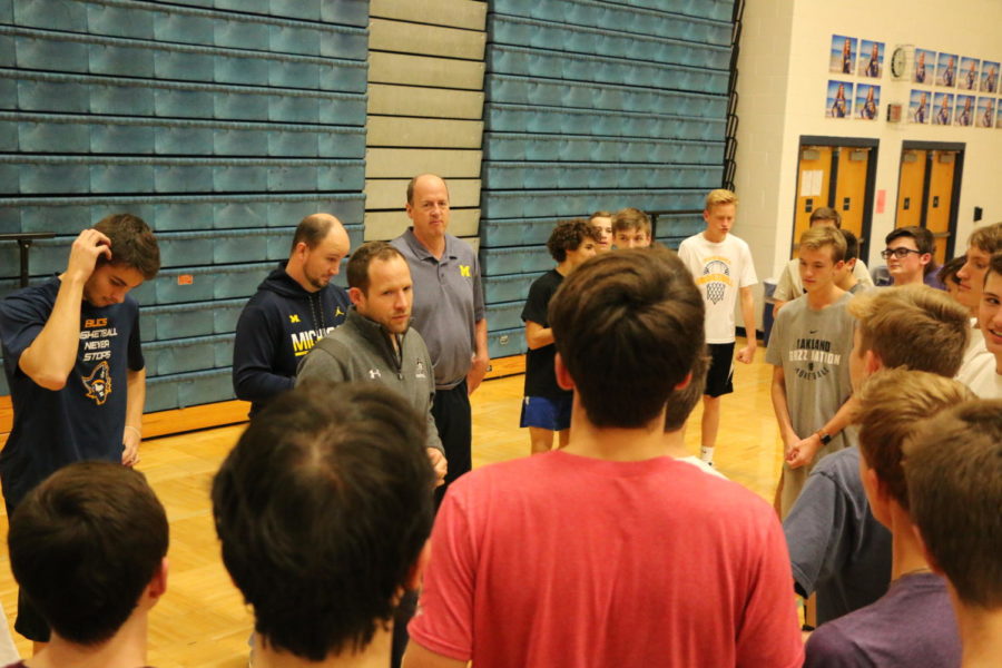 Head+coach+Greg+Immink+talks+with+the+program+before+a+practice.+