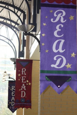 Banners in the library set the mood for reading. A steady flow of students make their way through the library daily. 