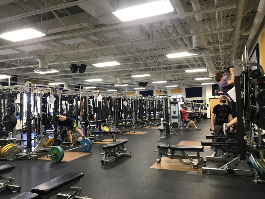 FITNESS CENTER: Students using the weight room after school. 