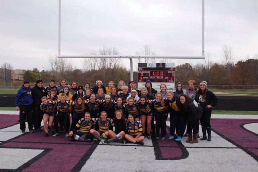 WINNING: The girls rugby team pictured after their third place win in fall 2019.