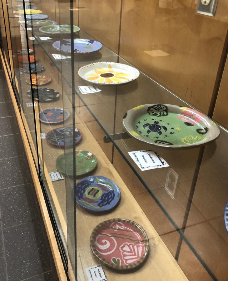 ON DISPLAY: Students ceramic artwork is displayed in the showcases in the first floor main hallway. I think its really important to showcase everybody, Sipe said. (photo by Camille Berko)