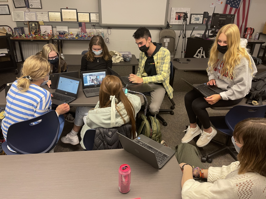 HARD AT WORK: Future PREPd members collaborate to finish the slideshow for an upcoming presentation. I think it is important to be in this club because it gave me a lot of chances to work on a group project that isnt school, Ritter said. Learning how to work well with others is important. 
