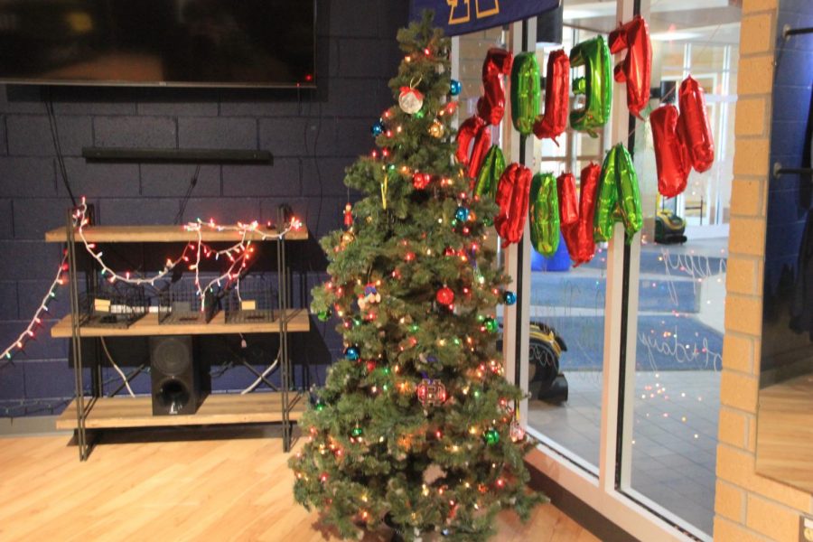 The Christmas tree can be seen sitting in the Buc Stop adorned with various ornaments. 