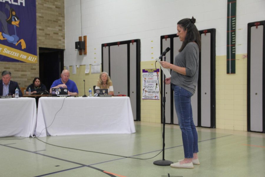 ADDRESSING THE BOARD: a Restoring Ottawa members shares their grievances with the Board of Education at the May 9 meeting.  