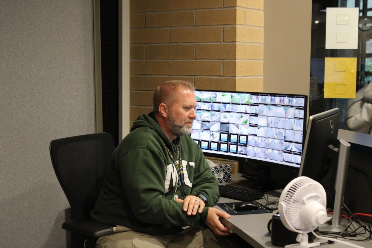 New security guard Todd Taylor watches over cameras all day assuring the safety of the staff and students.

