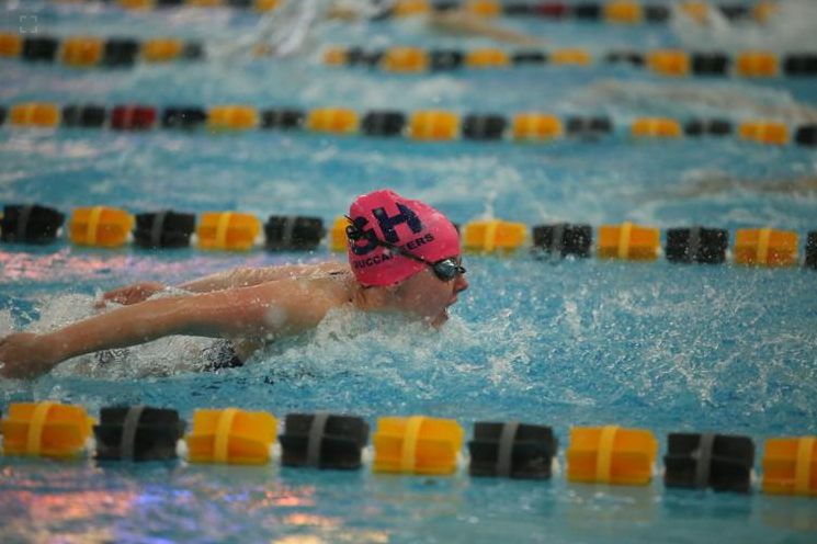 TRAINING INTENSIFIES: Senior Jocelyn Tollive flying at the Jenison meet on Sept. 28. All swimmers and divers did exceptionally well winning 162-153 but now they must work twice as hard to bring down Grandville on Thursday.
