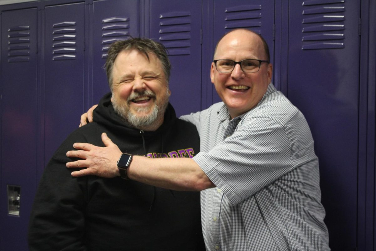 Teachers Mark Robertson and Thomas Puleo share just one laugh out of thousands. The two are going to miss one another as Puleo heads into his well deserved retirement.