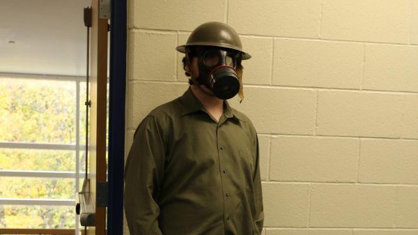 Class of 2023 student Jamie Donley wears a soldier-like outfit for Halloween. Students are encouraged to show off their costumes for the day.