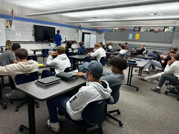 Teacher Matthew Naber inspires students in his fifth hour sports and entertainment marketing class on one of his Fantasy Football Thursdays. 