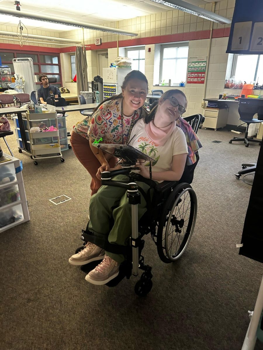 Mrs. Ellison connects with her student, Paige, bringing fresh energy and inspiration to the classroom.